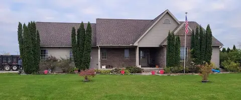 Residential roofing project with dark shingles in Metro Detroit